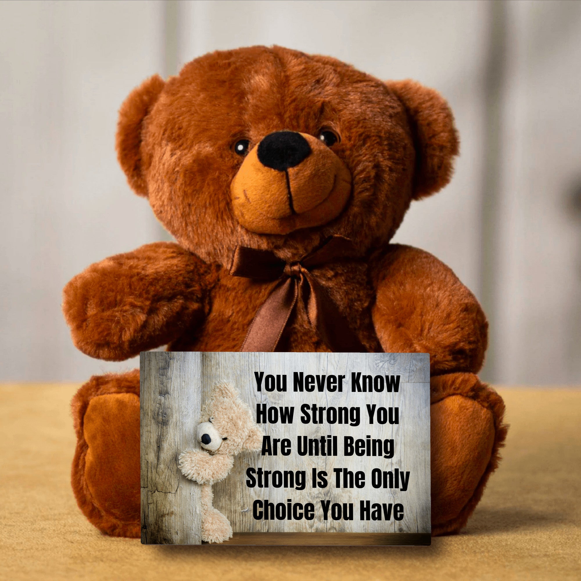 Teddy Bear with Sign You Never Know how Strong You Are