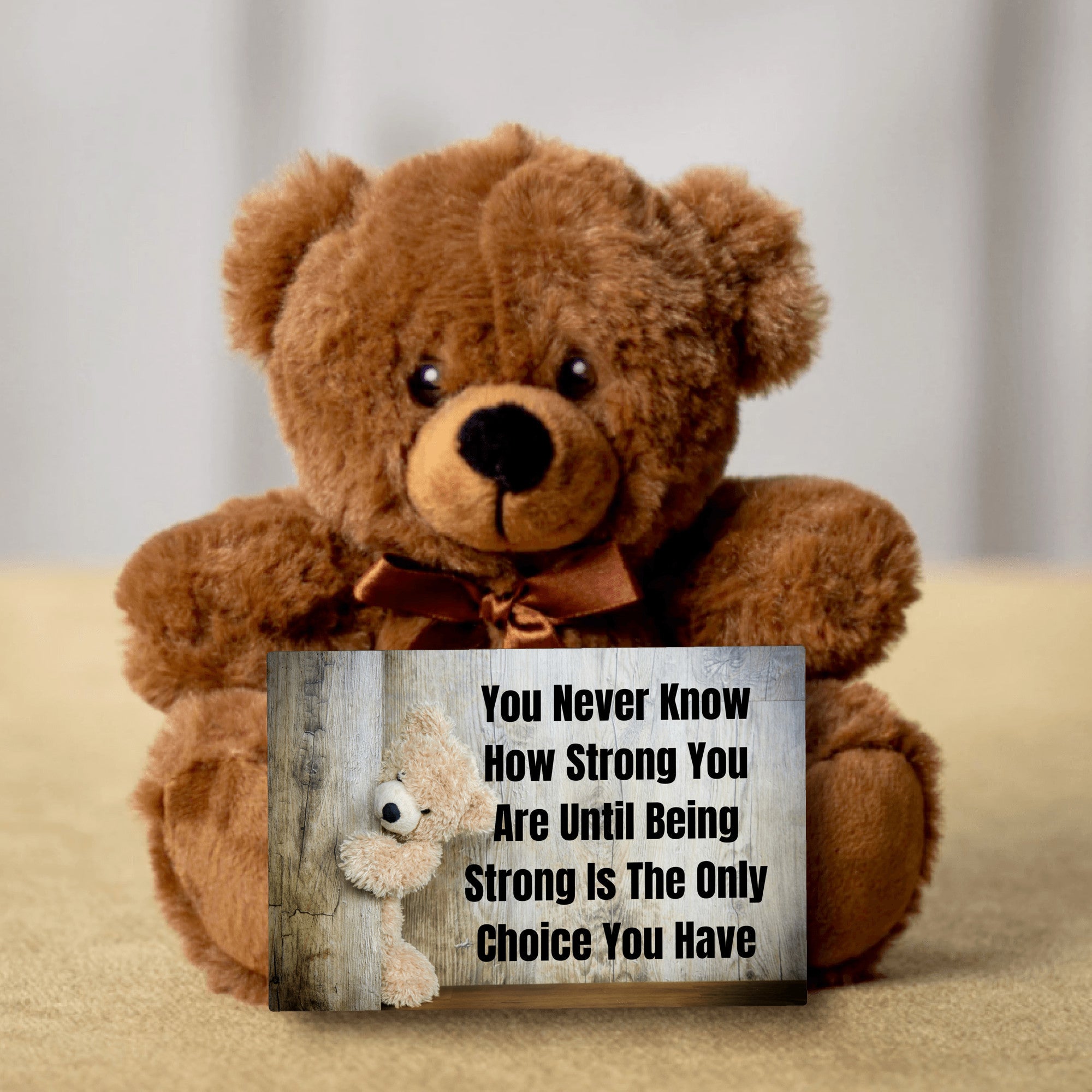 Teddy Bear with Sign You Never Know how Strong You Are