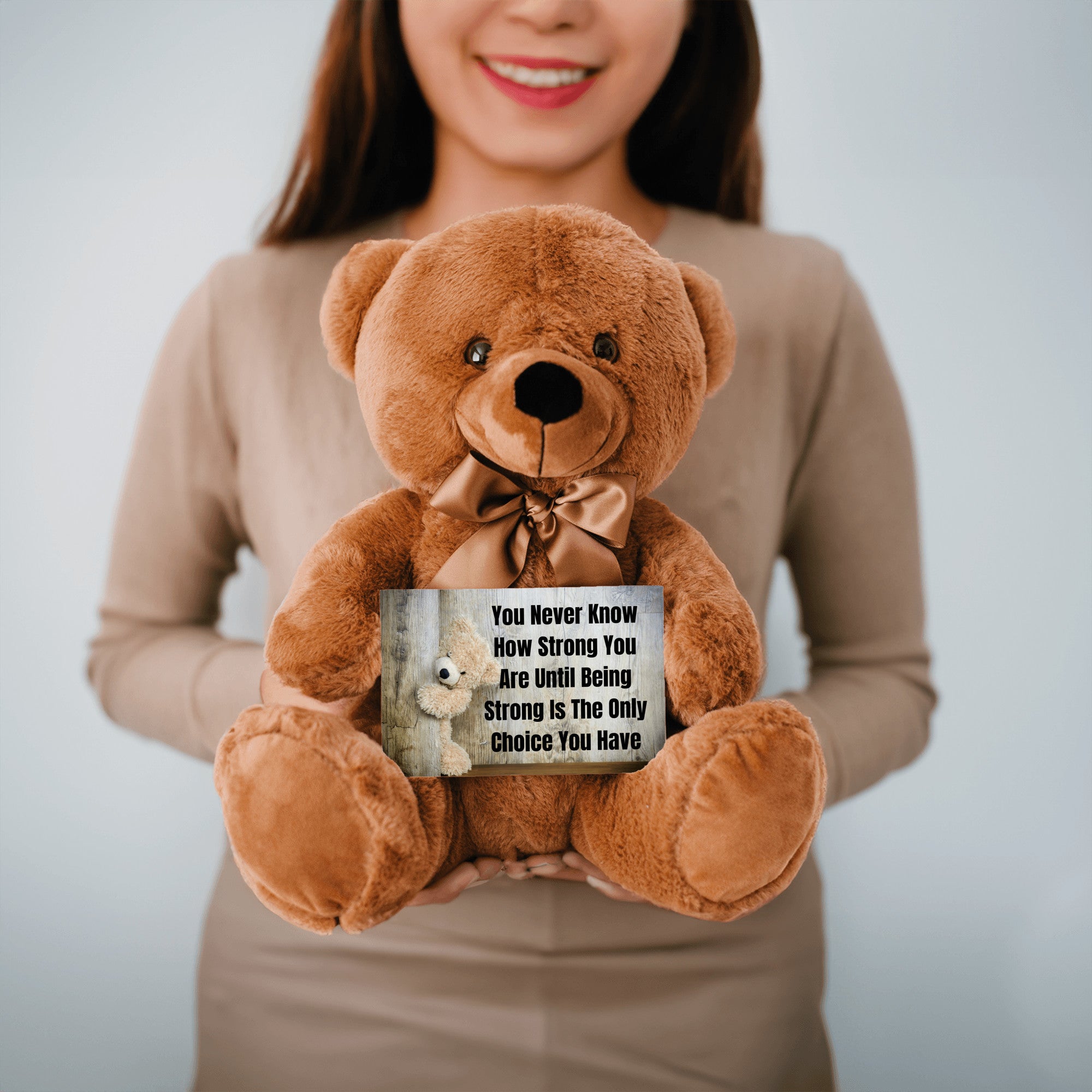 Teddy Bear with Sign You Never Know how Strong You Are