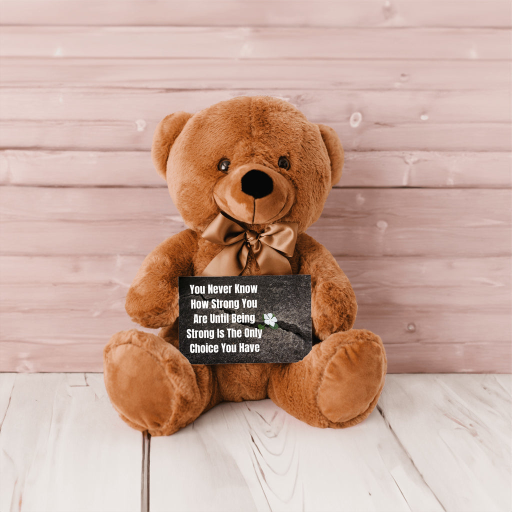 Teddy Bear with Sign You Never Know how Strong You Are