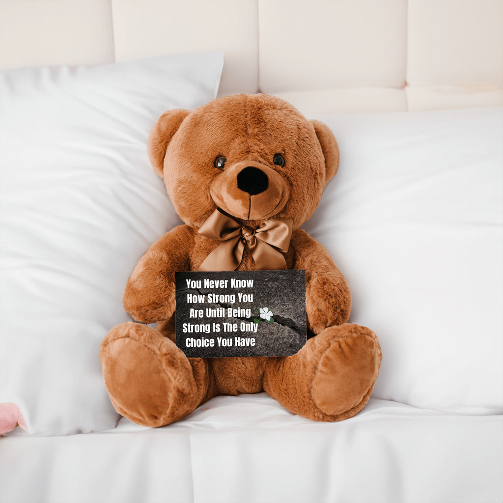 Teddy Bear with Sign You Never Know how Strong You Are